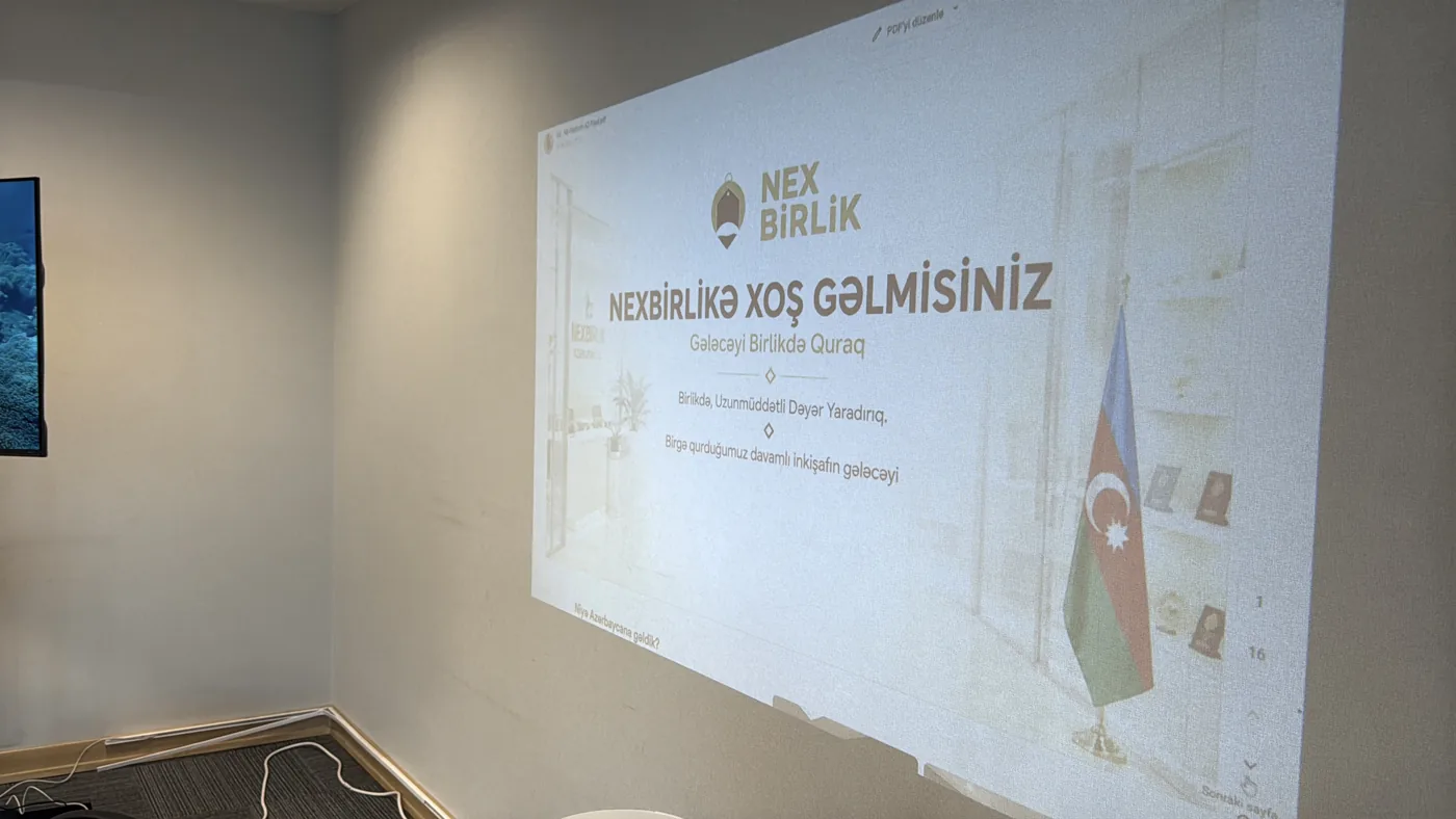 Divarda NexBirlik təqdimatının proyeksiyası · müştərinin təqdim etdiyi foto